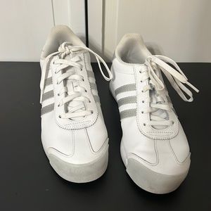 Adidas. White with sliver stripes. Women’s 6.5.